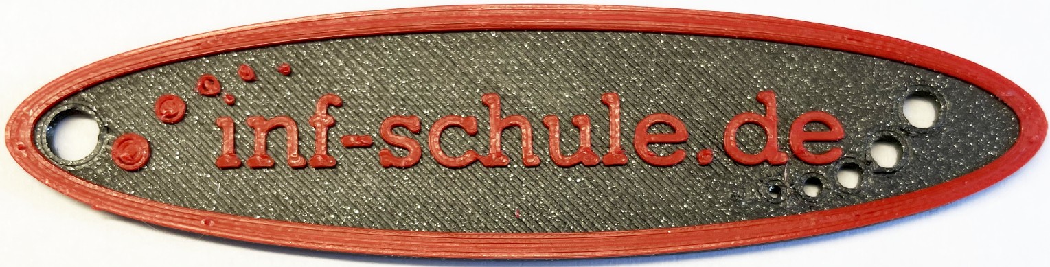 Schlüsselanhänger ausgedruckt Extrudierte Ellipse mit inf-schule Beschriftung unten schwarz oben rot